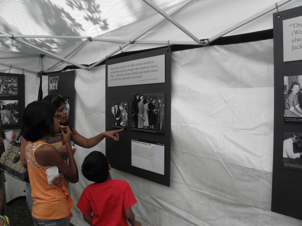 Visitors view an exhibit on Rose Kennedy