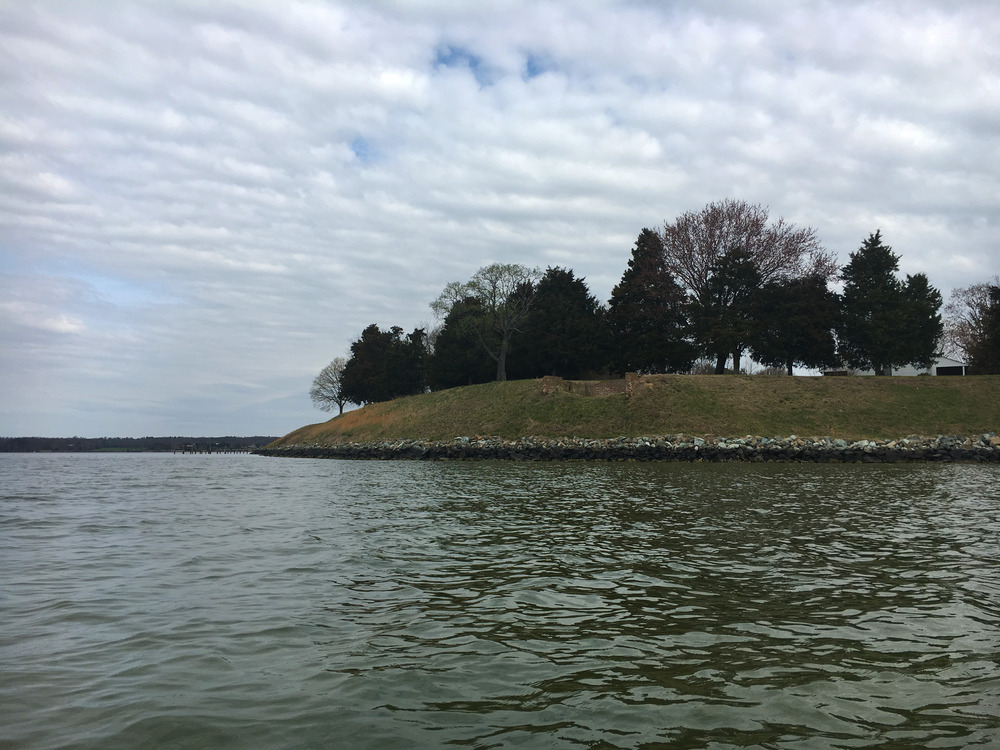 A choppy tidal Potomac stretches towards Rosecroft Point in the distance. 