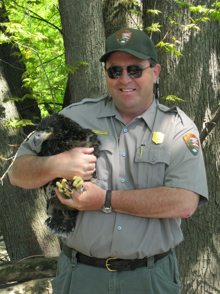 Superintendent Paul Labovitz holding an eagle