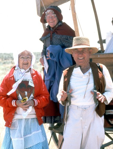 Three people enjoy their day on the Oregon Trail.