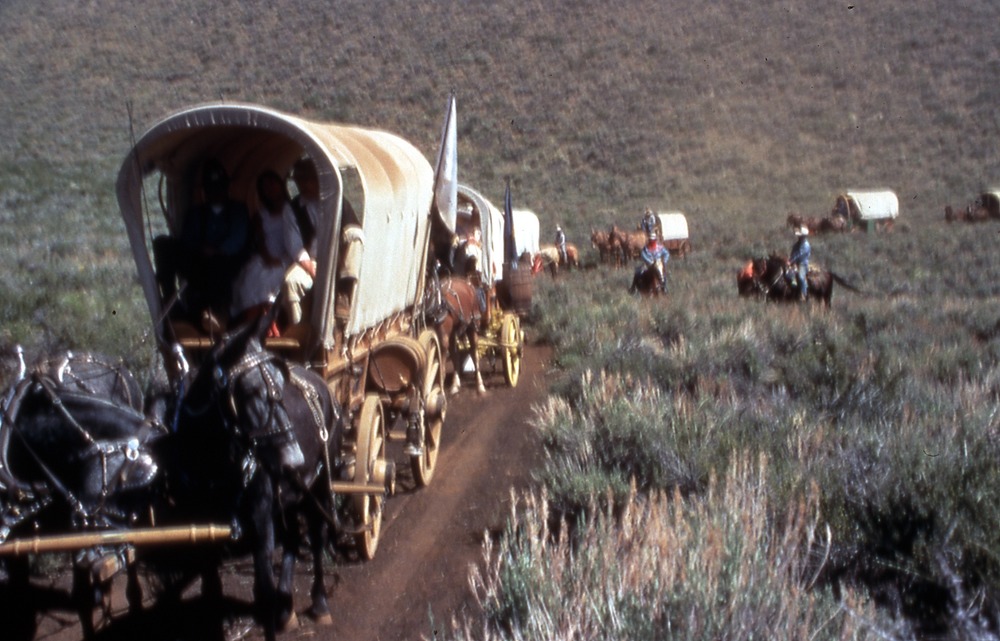 A line of wagons on the Oregon Trail.