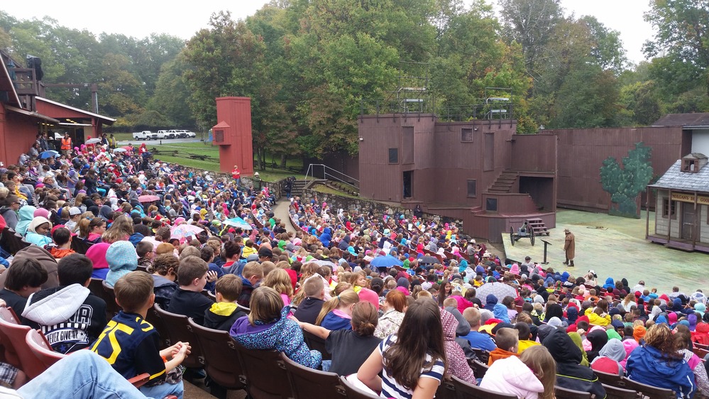 outdoor theater full of kids