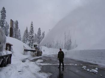 April 1, 2006. Between March 31 and April 1 the southwest entrance received over 27 inches of snow. In this picture you can see our large rotary snow blower clearing out the parking area.