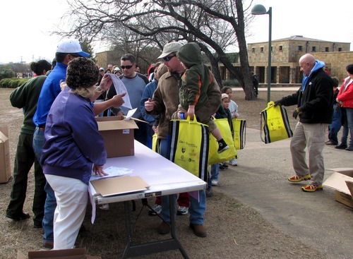 welcome table handing out free outdoor packs