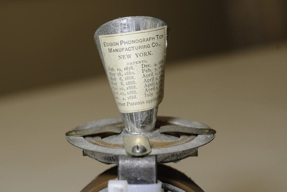 Edison Talking Doll mechanism - detail view of patent sticker