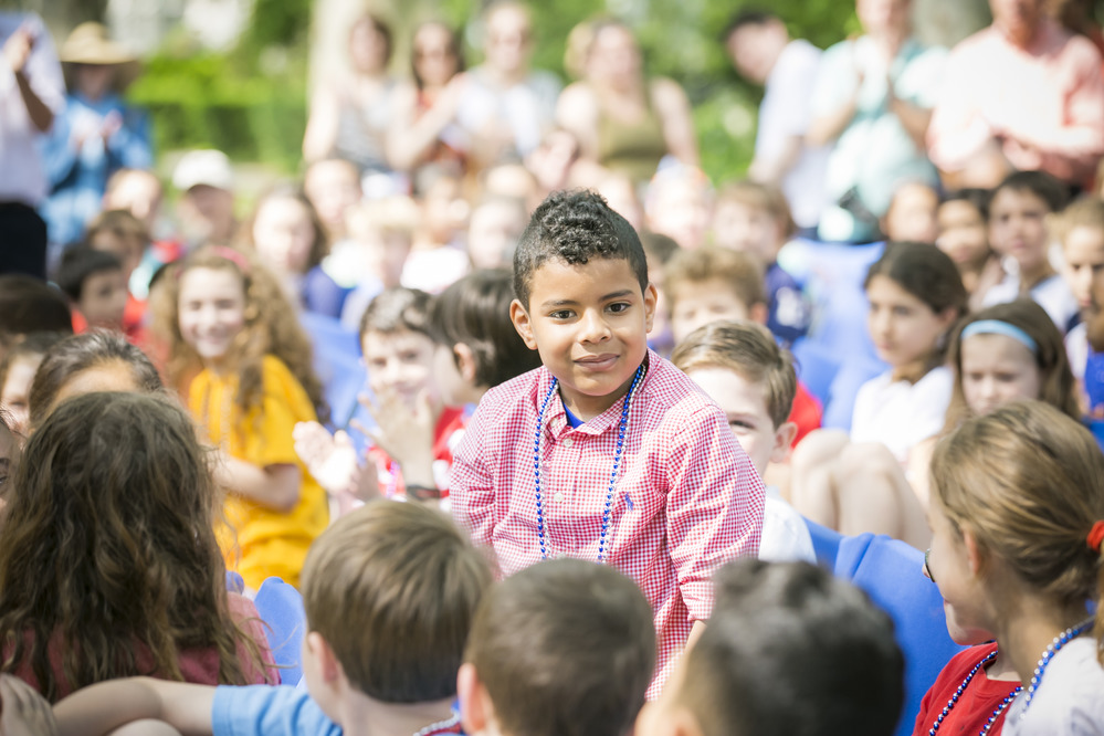 Devotion School student stands to be recognized