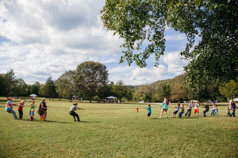 Kids playing tug of war.