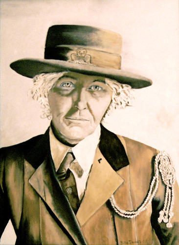 A pencil and watercolor portrait in sepia tones depicts a middle-aged woman in a 1920s Girl Scout uniform.