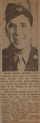 Newspaper clipping with photo of uniformed man at top.  Headline reads 