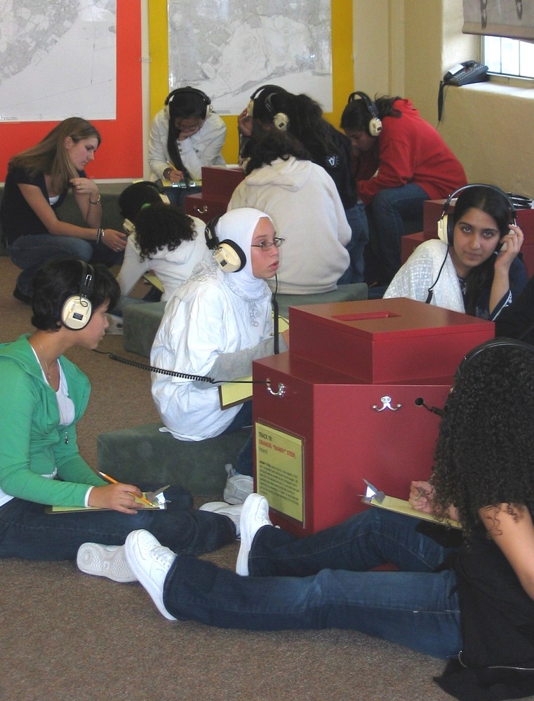 In the education program "To Be Somebody in America," eighth graders listen to the oral histories of Ellis Island immigrants. Then they act out the stories in short dramatic presentations.