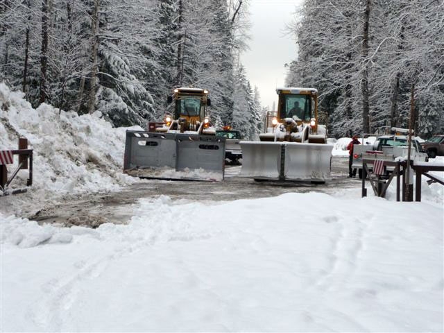 Plows at the Lake McDonald gate ready to start spring plowing operations.