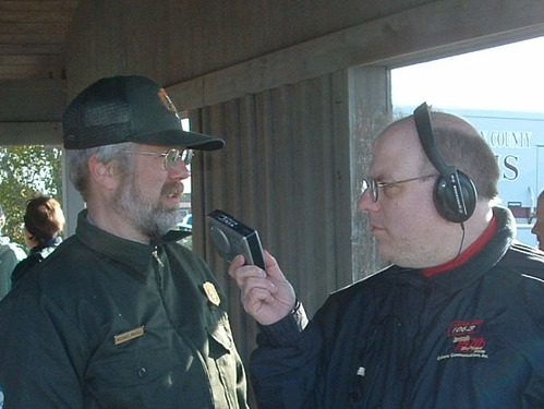 MNRR superintendent Mike Madell talks with a local radio personality about the river cleanup.