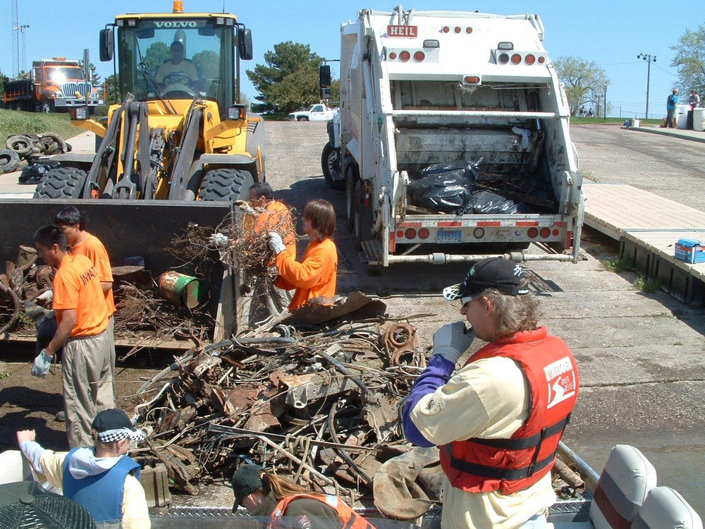 Unloading scrap metal at Riverside Park.