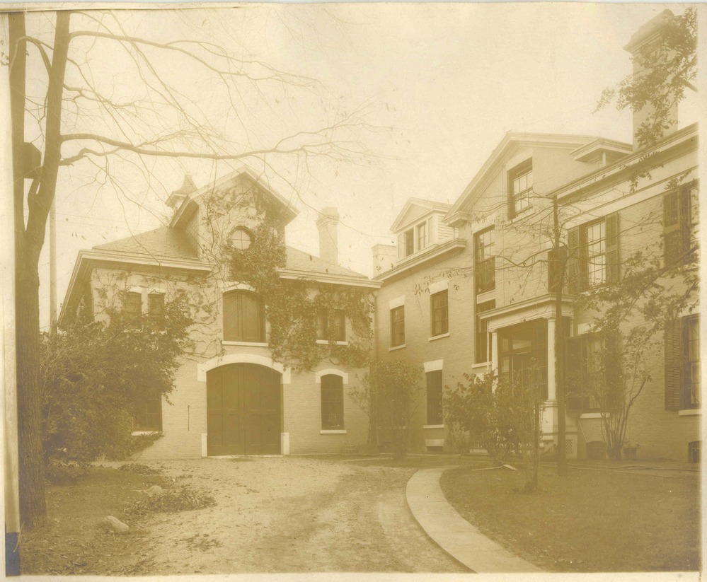 This c. 1921 photograph shows the Wilcox home at right, and the carriage house to the left, standing to the north side of the house. This carriage house stood here in 1901 when Theodore Roosevelt visited, and was inaugurated as President, here. The carriage house was torn down in the late 1930's.