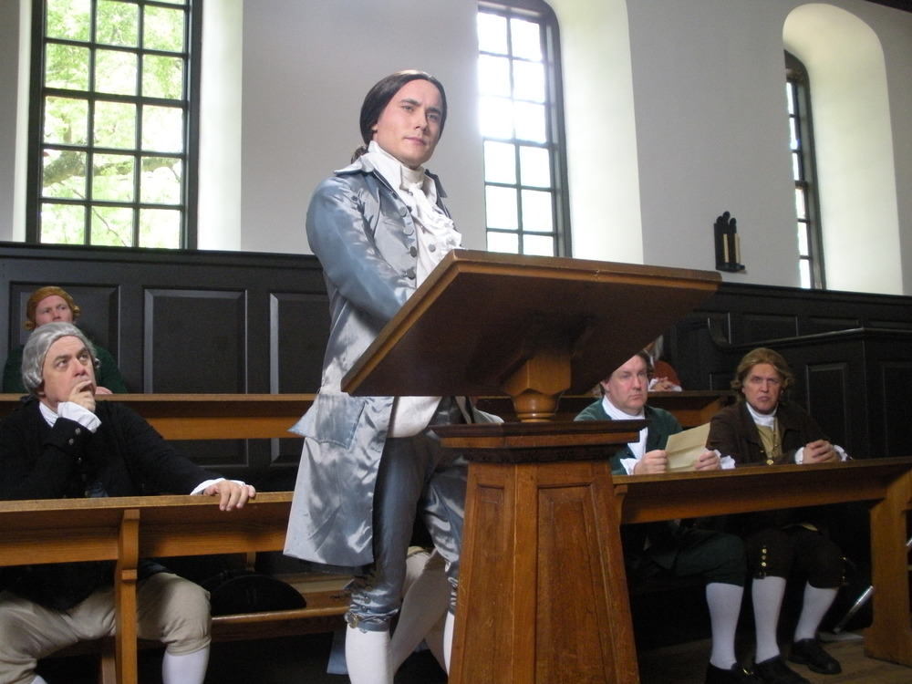 An actor portraying Alexander Hamilton addresses the Continental Congress.