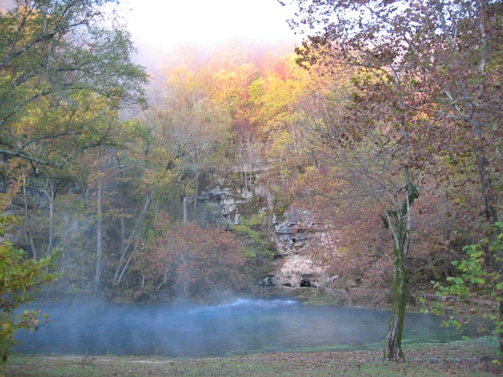 Big Spring on a cold fall morning with the mist steaming around it.