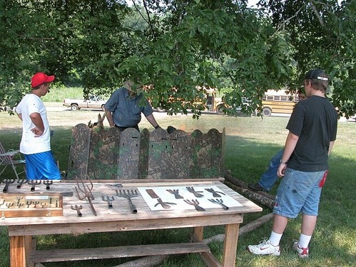 Making fish gigs by hand.