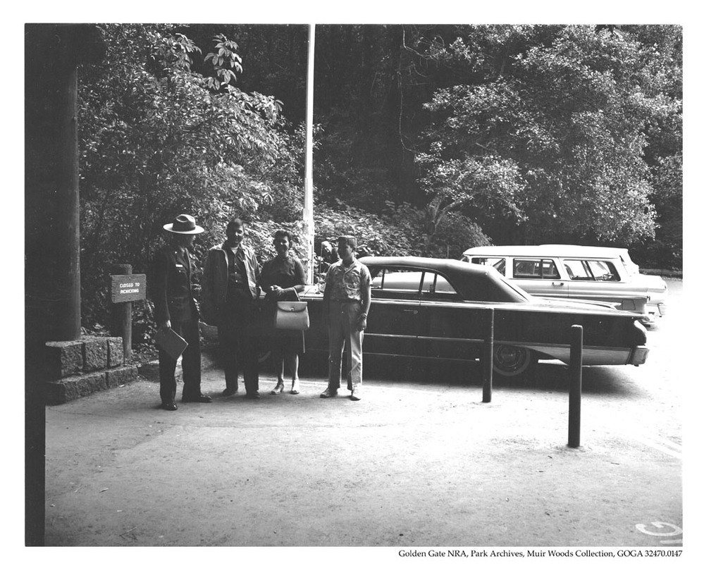 Ranger seen greeting a family on 'One Billionth Visitor Day' to the National Parks, August 22, 1962. Visitors are: Dr. and Mrs. Max J. Trumer, Baldwin N.Y. and son. Photograph taken by: Park Ranger Arthur A Volz