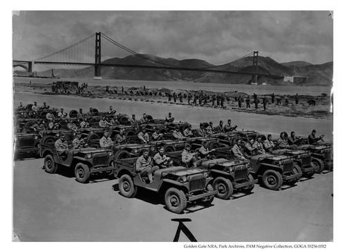 Troops in vehicles lining Crissy Field, 1941