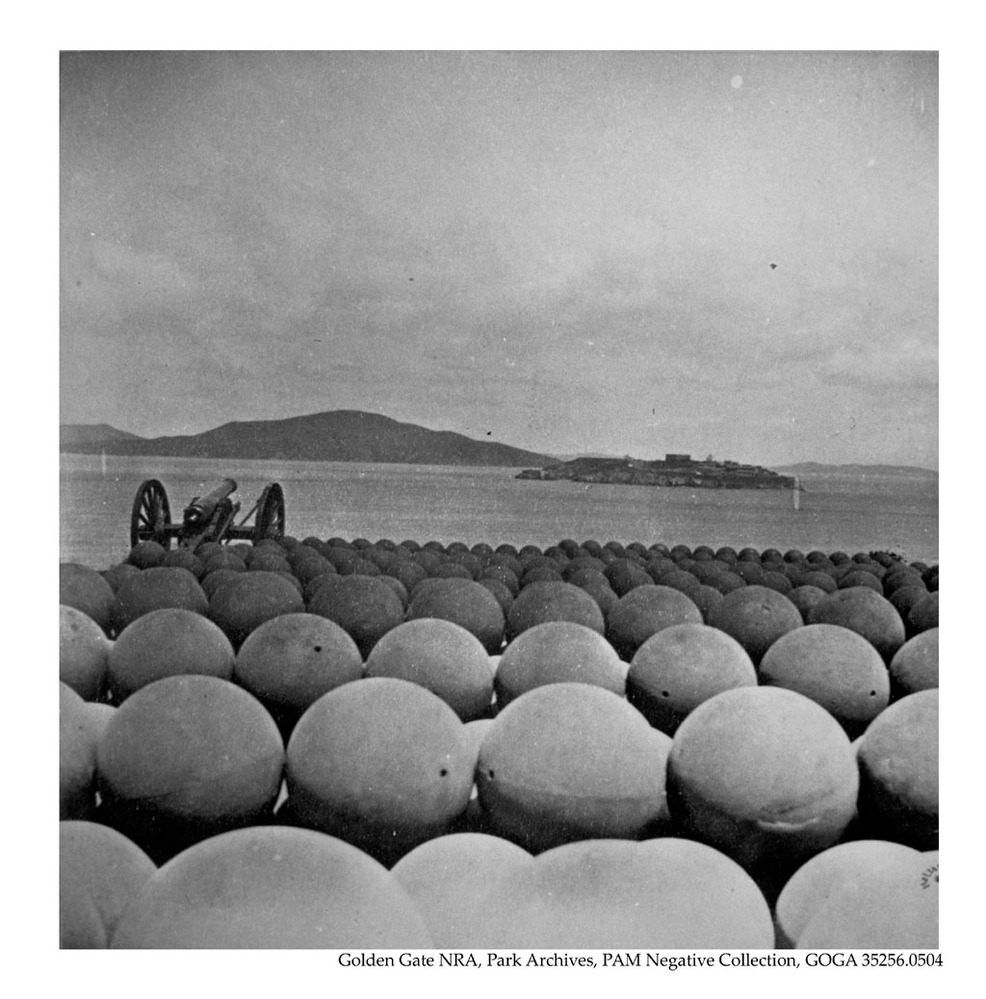 Cannonballs fir the 15" Rodman Ammunition gun at Fort Mason, looking towards Alcatraz, c1869.