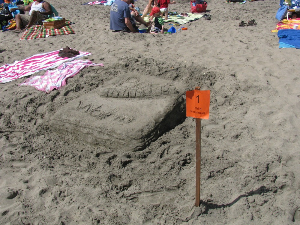 2009 Sand Sculpture Contest: Children’s Individual 1st Place Winner: Entry #01: Bookworm, by Nicole