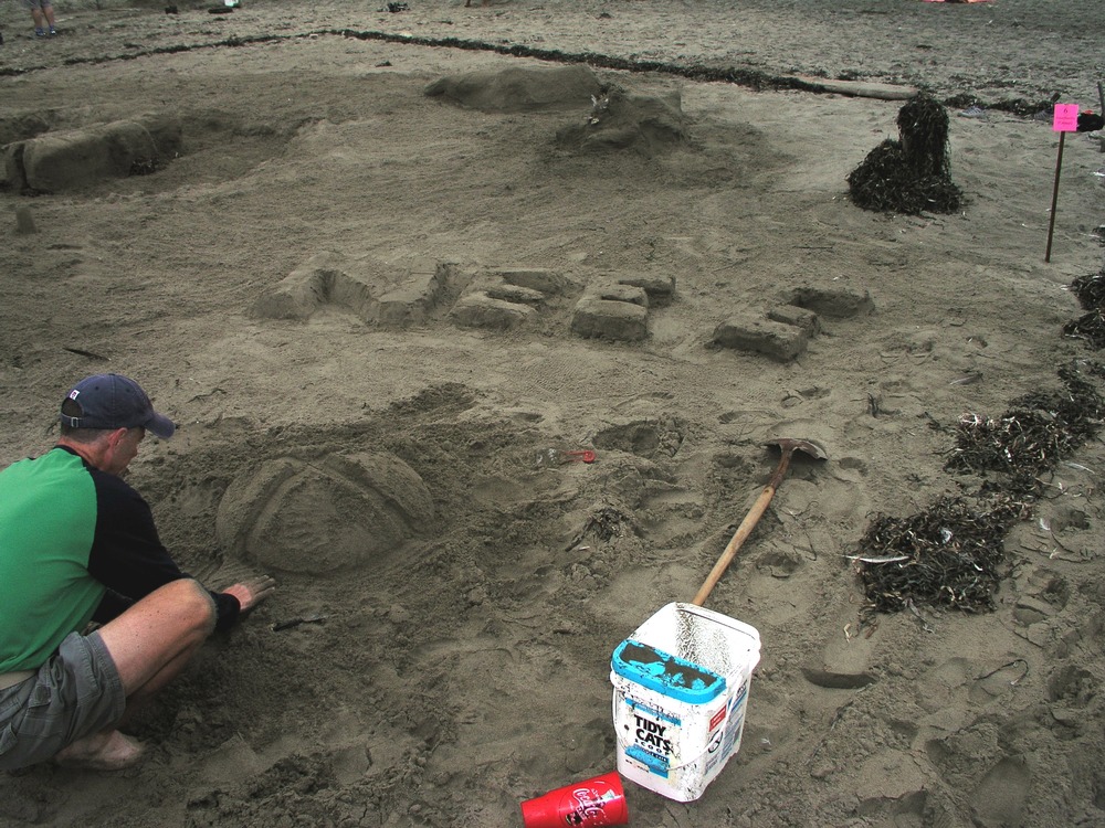 2006 Sand Sculpture Contest: Adults' Group Entry #6: Just a Flesh Wound by the Liles and Bartlebaugh Families, Detail 2
