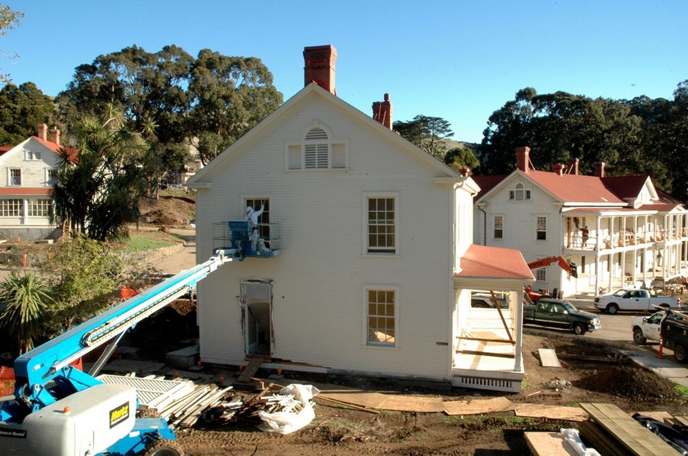 As the construction project continues, all of the historic buildings are being repainted in the same historically-appropriate paint colors. Here, contractors are painting building 603, the former administrative headquarters for the post.
