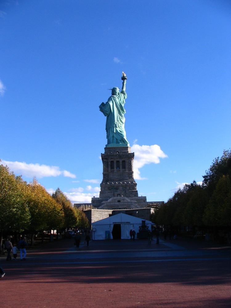 Mall grounds at Liberty Island with Statue in background.