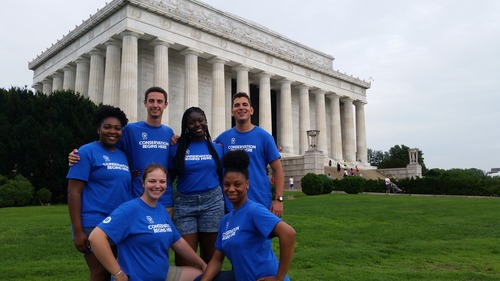 Group of six interns in front of Lincoln Memorial