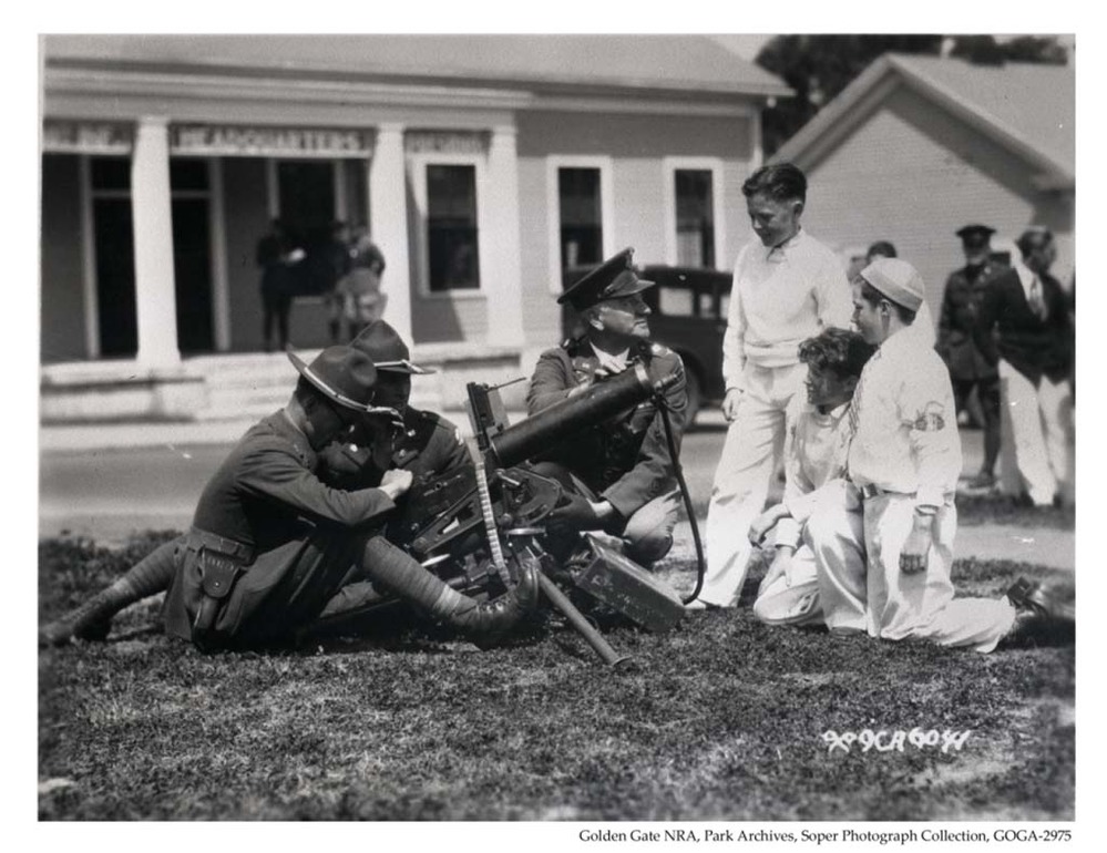 “Jr Traffic Cops examining D Company machine guns, ‘29”