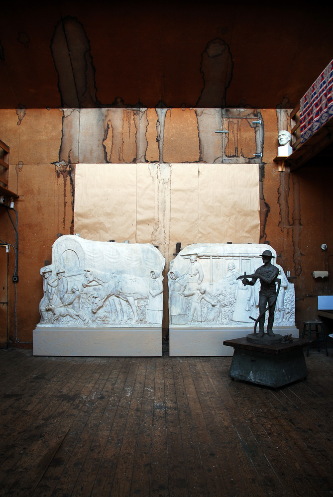South wall of Young Studio, interior, with plaster relief casts from This is the Place Monument