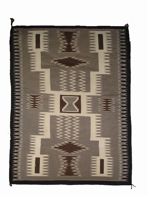 Navajo Rug, Storm Pattern Design Any colors may be used. Laterally symetrical. Includes a center square with 4 zig zag lines (lightning) radiating out from it to the 4 corners ending at another square (the 4 sacred mountains). Usually has a simple border.