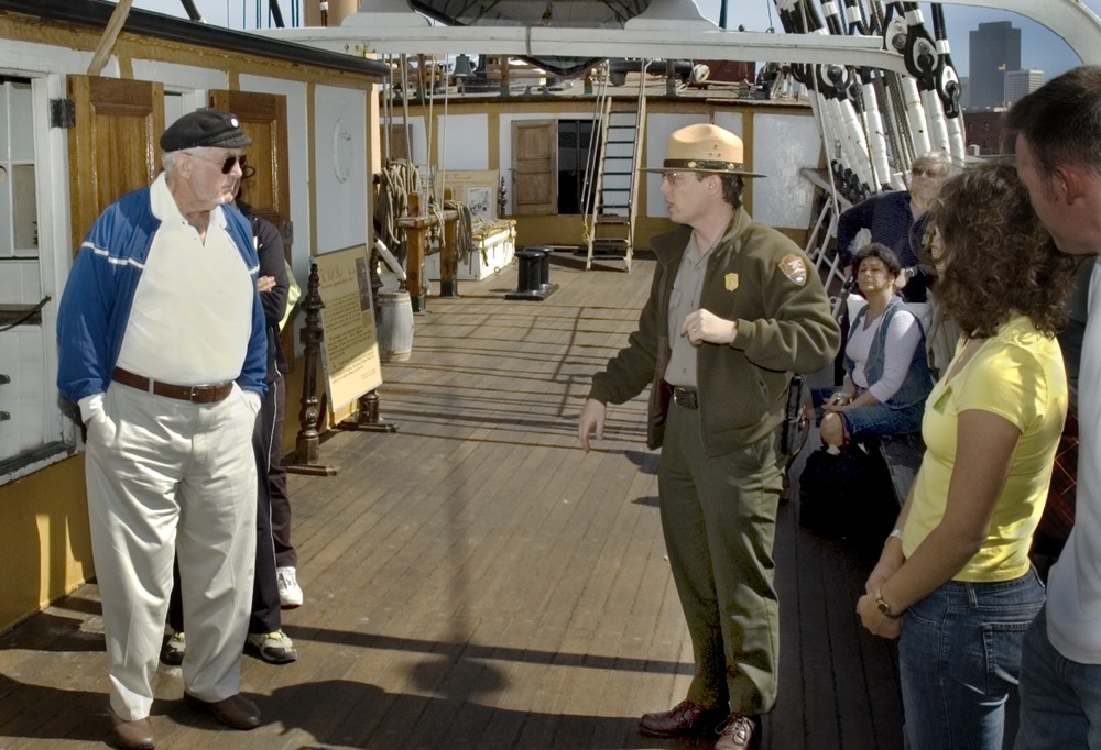 Park Rangers provide tours of the historic ships at Hyde Street Pier. This group is on Balclutha's main deck.