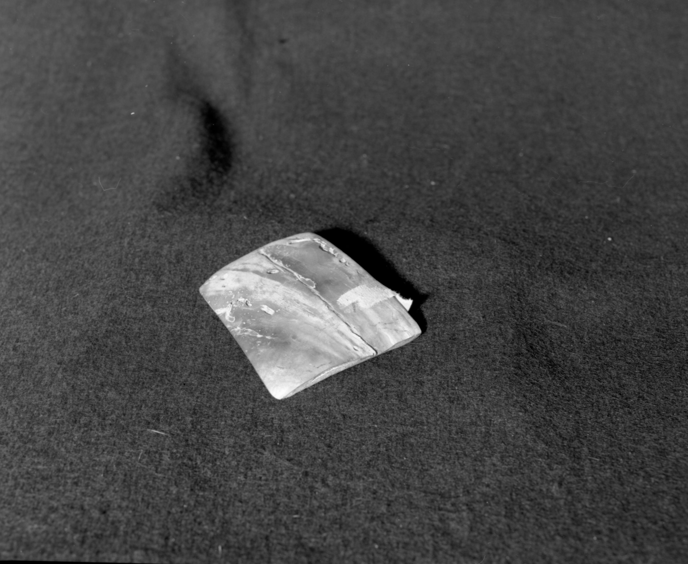 Marie Rozier Collection, Catalog No. 79. Object: Miwok abalone shell pendant. Dimensions: 3 1/2". Materials: Abalone shell. Collection History: Gift of Mrs. Berry. Photographed by Michael Dixon in December 1982. Catalogued by Craig Bates and Barbara Beroza. Yosemite Collections, National Park Service.