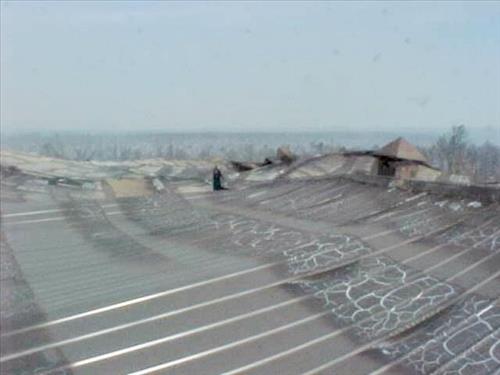 Fire damage to the water tank structure from the Long Mesa Fire, Mesa Verde National Park, July-August 2002