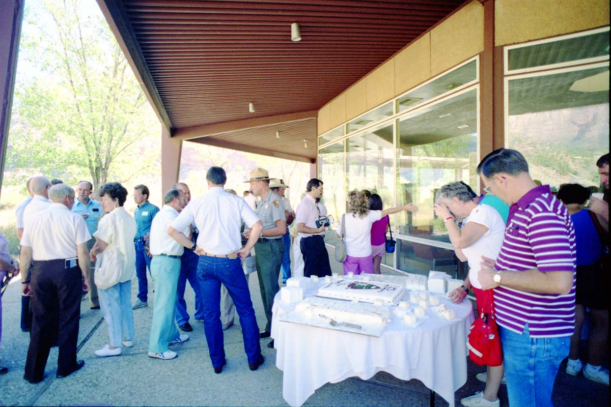 Color Photos of the parks 72nd anniversary celebrations- cake cutting, barbecue, speakers.