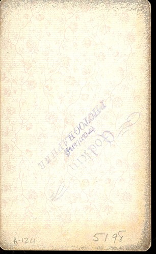 Native American Man in Tailored Suit and Police Badge