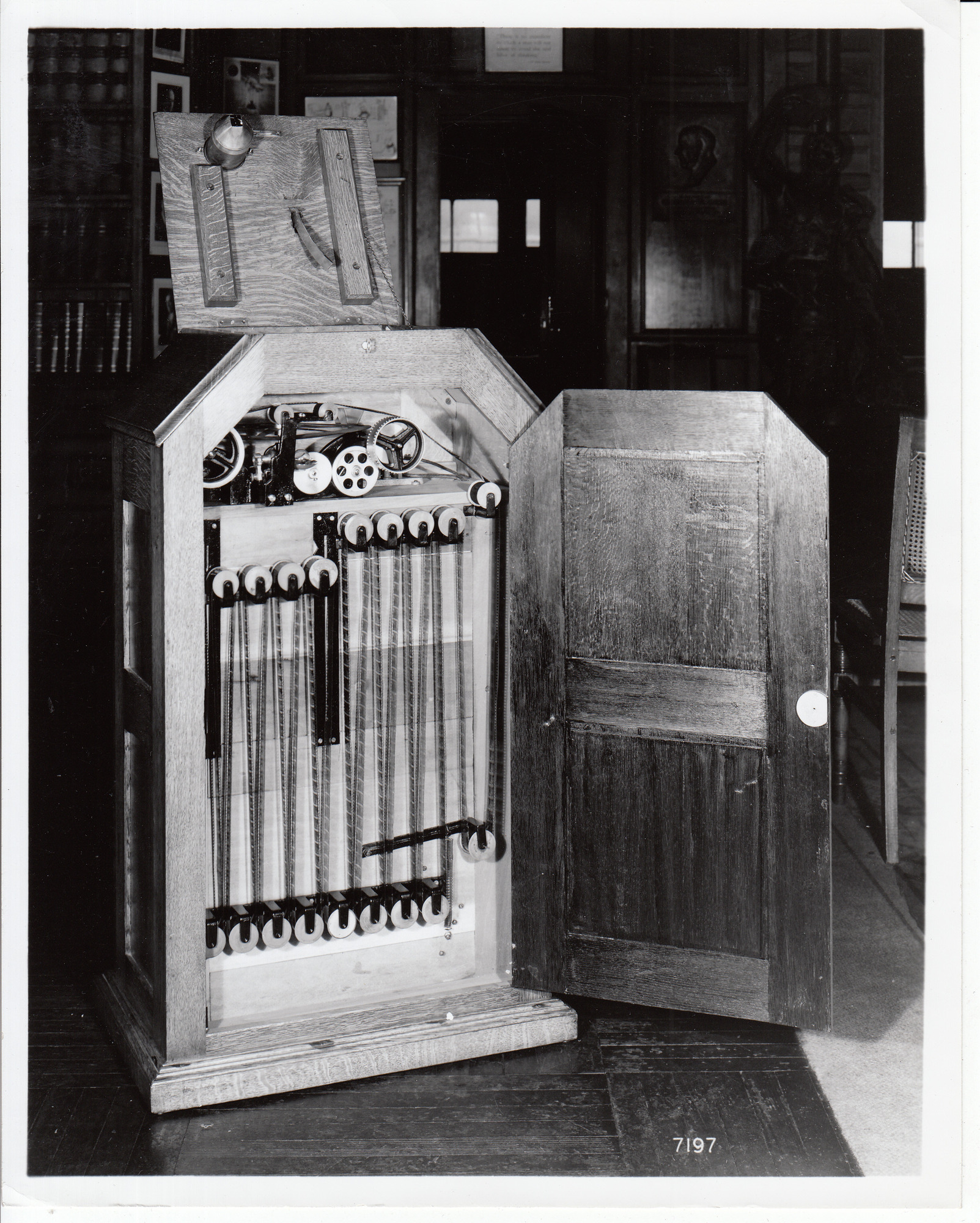 Kinetoscope (1894) in Edison's West Orange library, doors open to reveal mechanism.