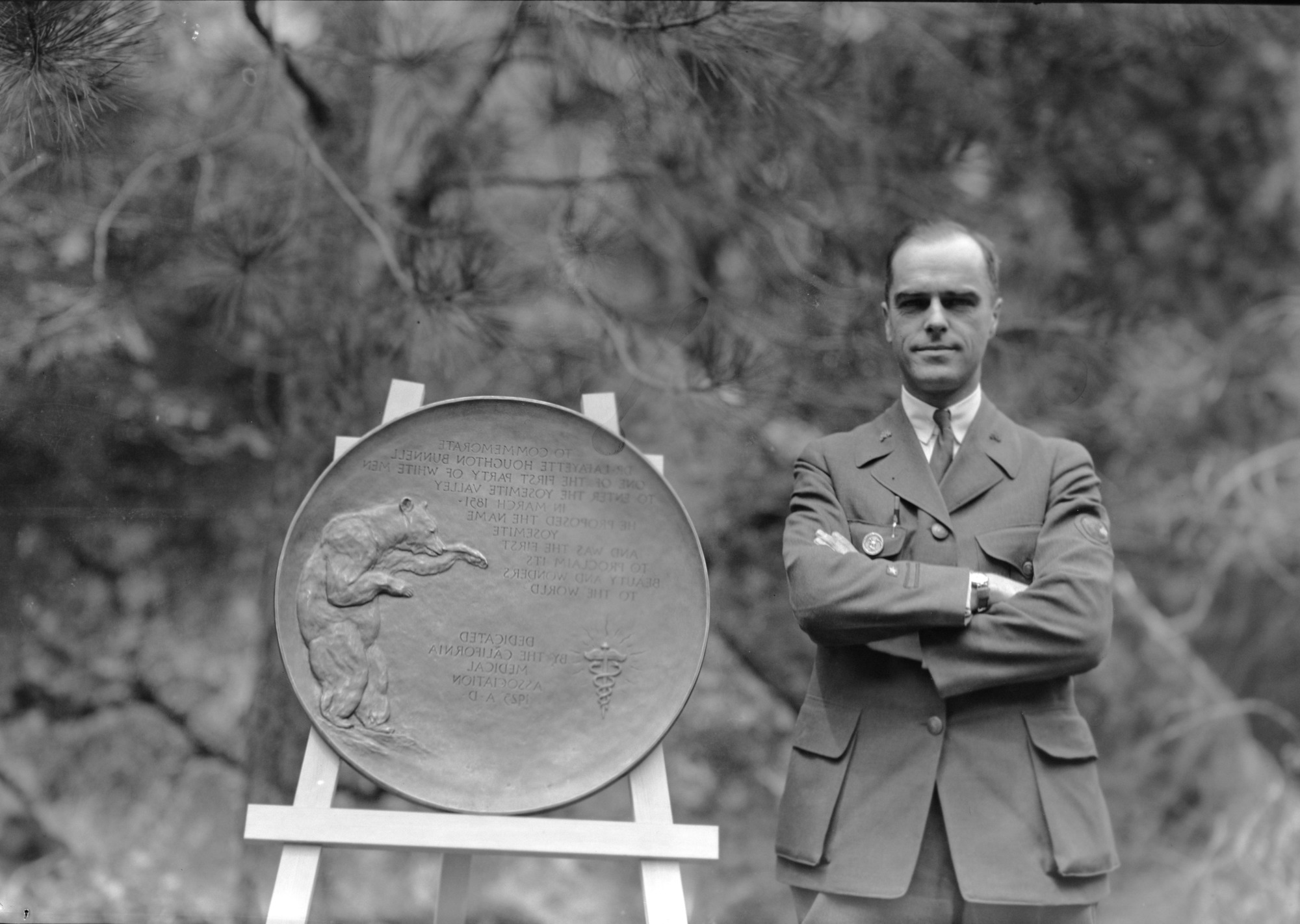 Supt. Lewis with plaque dedicated to Lafayette Bunnell.