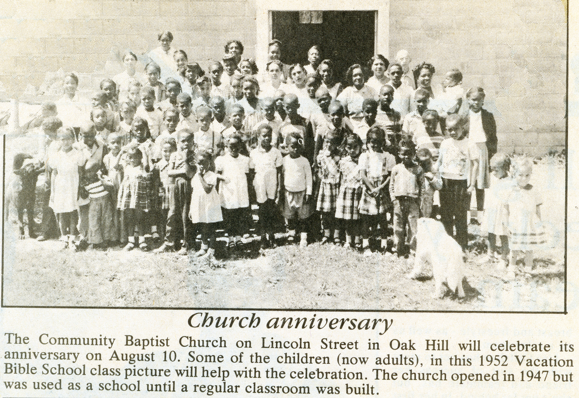 newspaper clipping of people posing at a church anniversary