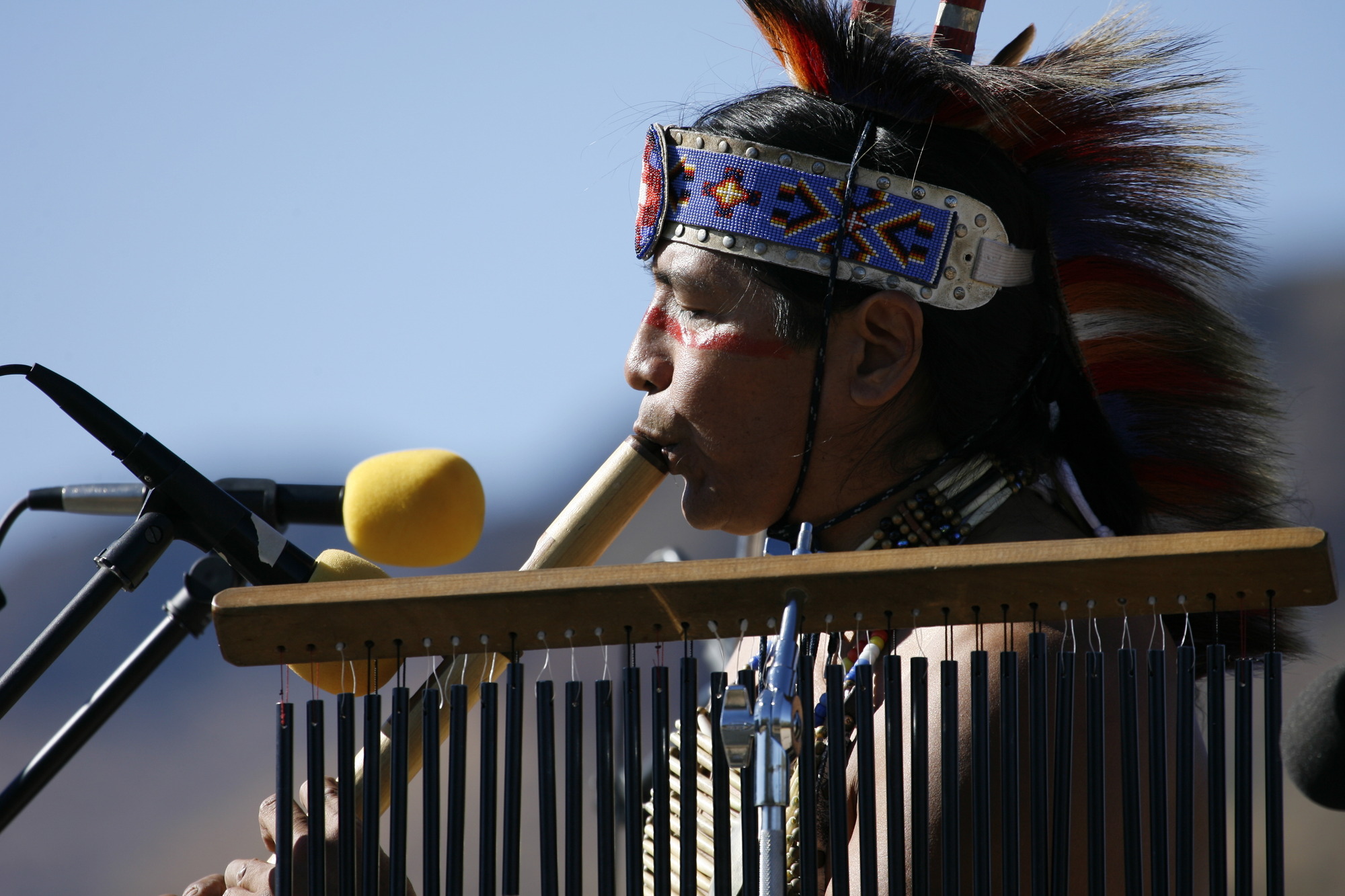 Navajo flute player on stage