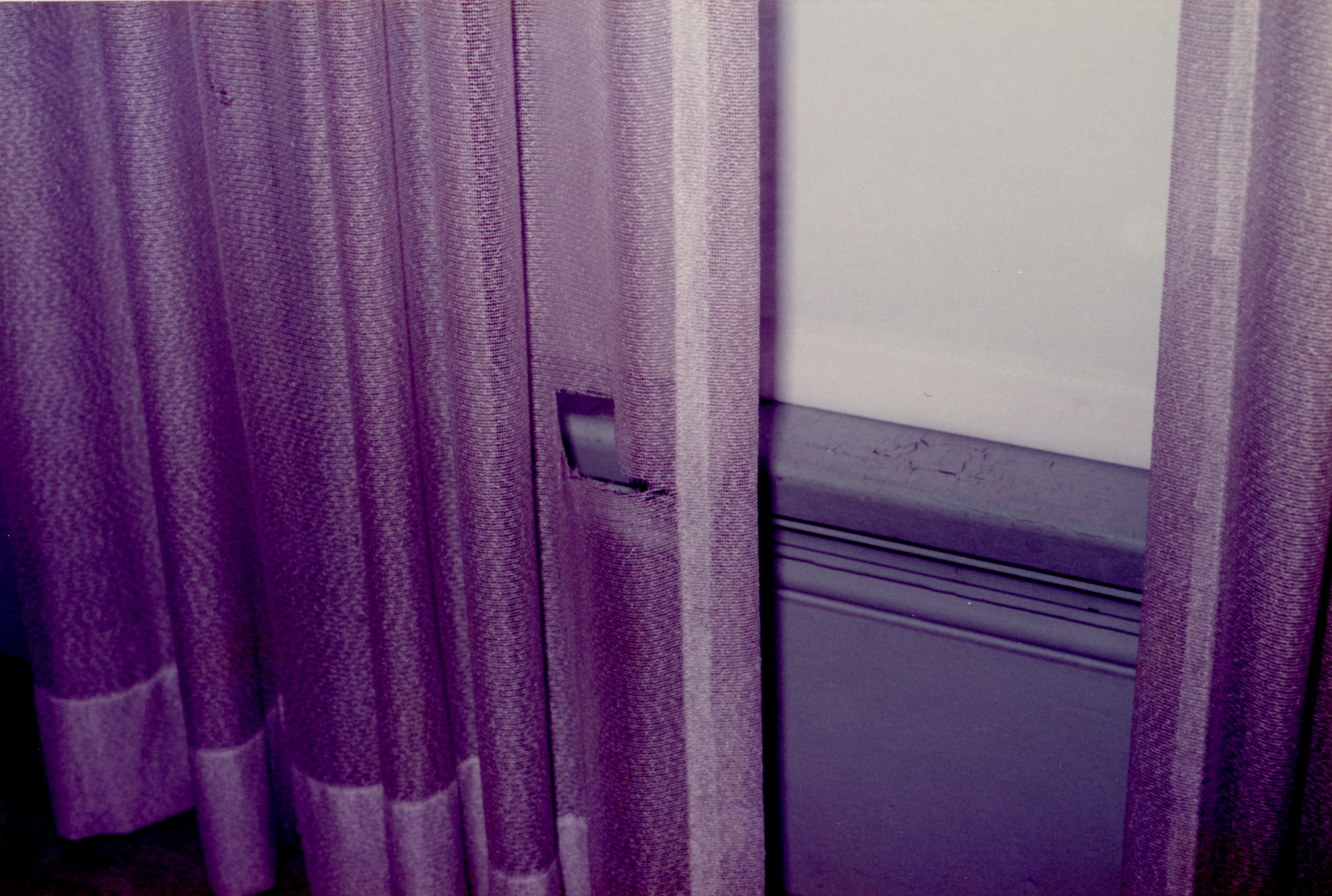 Curtain torn at bottom SE wall master bedroom curtains