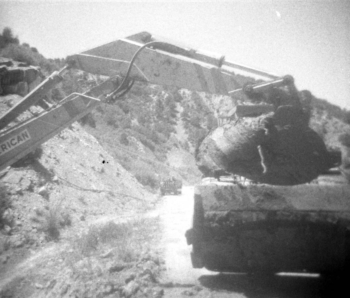 BW photos of rock slides in Kolob Canyons - 110mm. Trackhoe clearing rock debris.