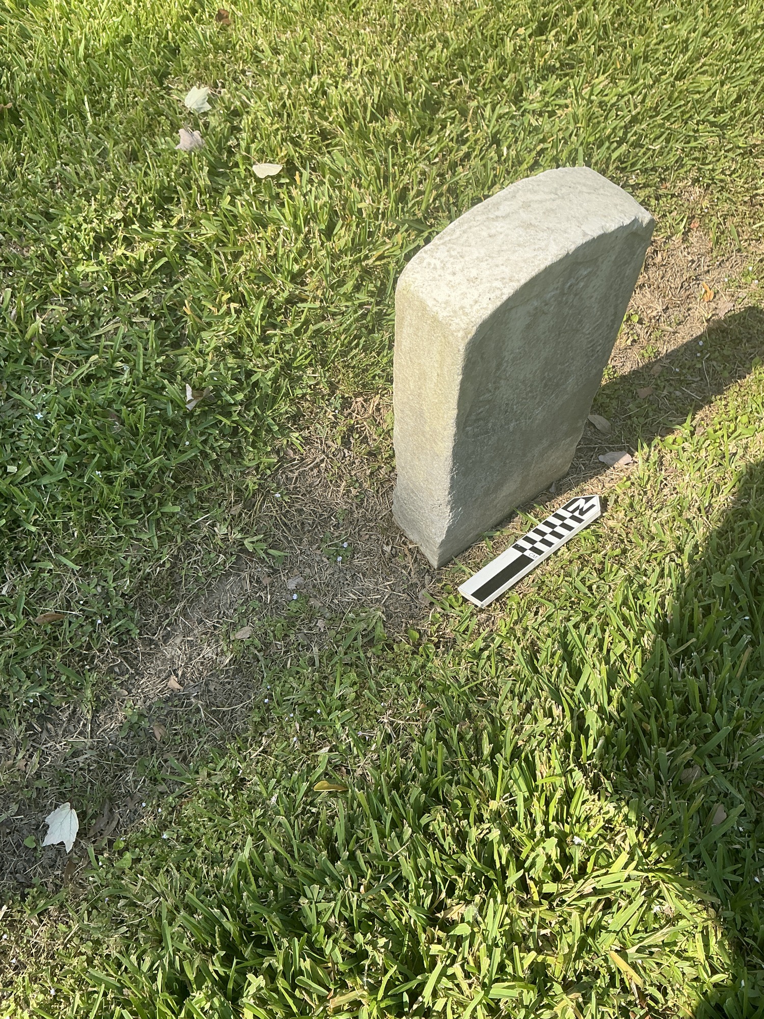 Extra image of historic upright marble headstone with recessed shield face.