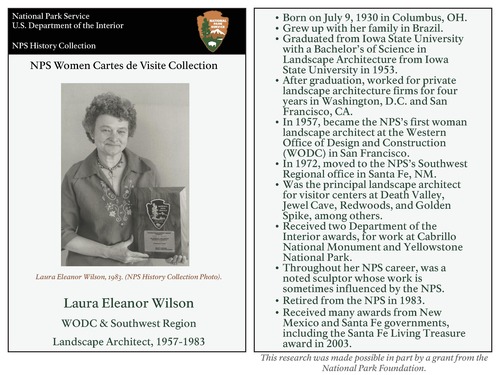 Laura Eleanor Wilson holds an award she received. Download file to access biographical information.