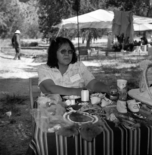 Ruth Benson, Paiute, demonstrates beading and leather work at third Folklife Festival at the Zion National Park Nature Center, September 1979.