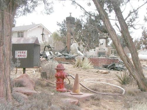 Burned houses following the Long Mesa fire, Mesa Verde National Park, August 2002