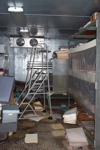 Museum storage area after flood waters receded.