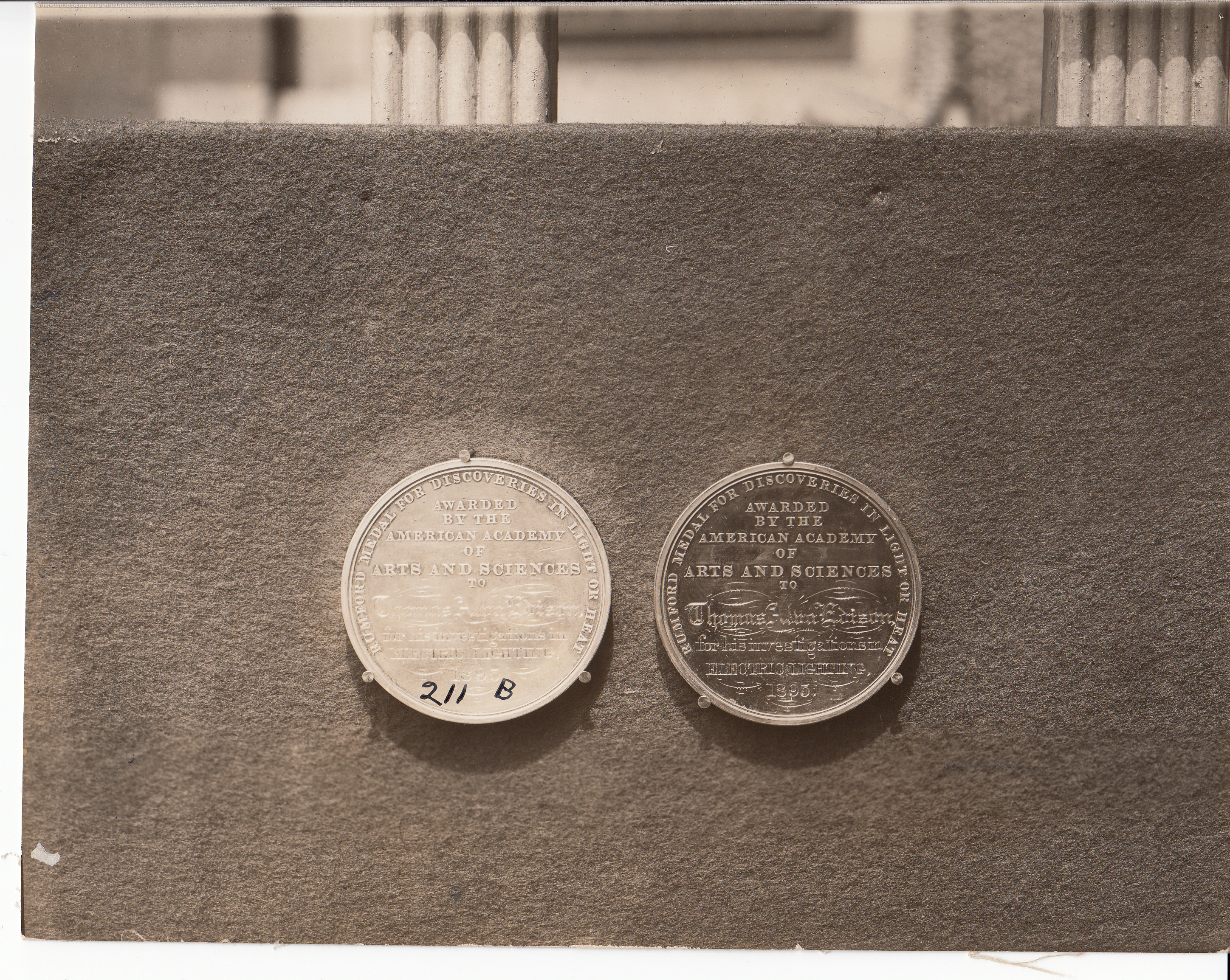 Two Benjamin Count Rumford medals for discoveries in light or heat (citation side) date on medals - 1895.