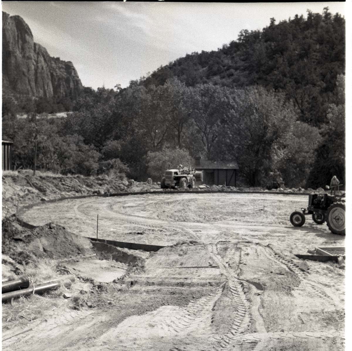 Construction of million gallon water tank- left and right halves of tank base being prepared for laying floor.